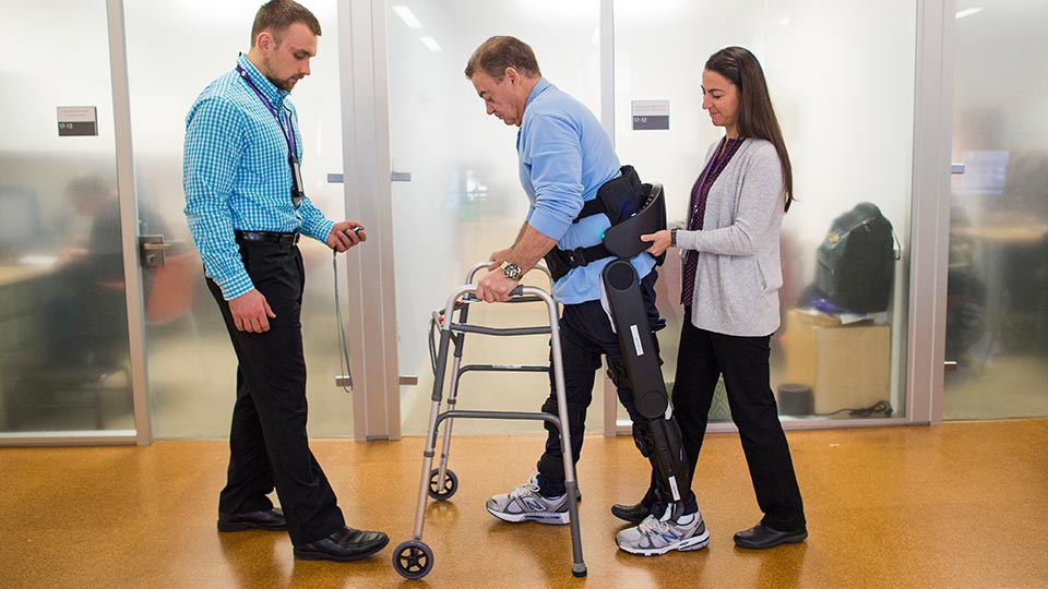 Working with a patient on gait